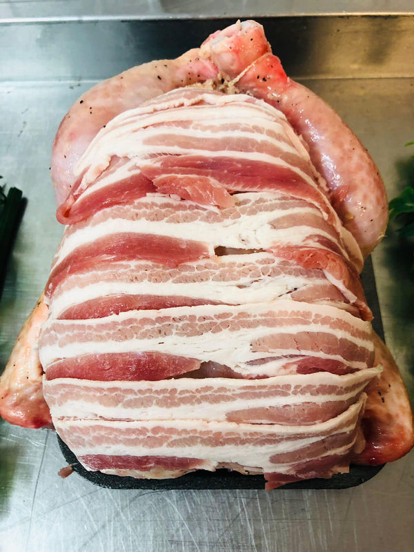 Capon Wrapped In Streaky Bacon